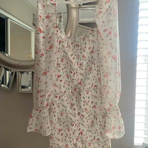 Super cute white flower dress.